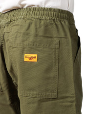 BERMUDA UOMO SERVICE WORKS OLIVA IN TELA DI COTONE BIO CON COULISSE E TASCHE