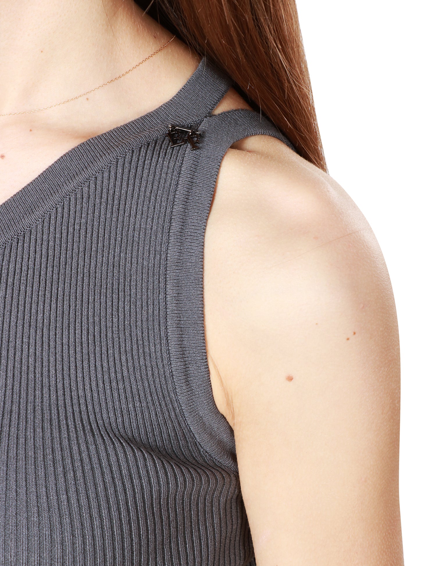 Top cropped asimmetrico in maglia a costine