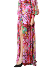ABITO LUNGO CARLA RUIZ ROSA A FANTASIA FLOREALE CON MANICA LUNGA E SCOLLO A V IN CHIFFON