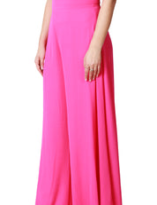 TUTA DONNA CAROL RUIZ FUXIA CON MAXI ROSA SULLO SCOLLO E PANTALONE CROPPED AMPIO