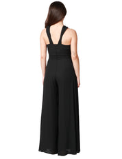TUTA DONNA CARLA RUIZ NERA CON MAXI ROSA SULLO SCOLLO E PANTALONE CROPPED AMPIO