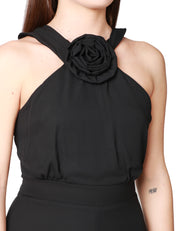 TUTA DONNA CARLA RUIZ NERA CON MAXI ROSA SULLO SCOLLO E PANTALONE CROPPED AMPIO