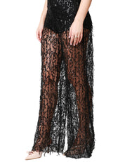 TUTA DONNA CARLA RUIZ NERA CON PAILLETTES ALL OVER E SCOLLO A V PROFONDO