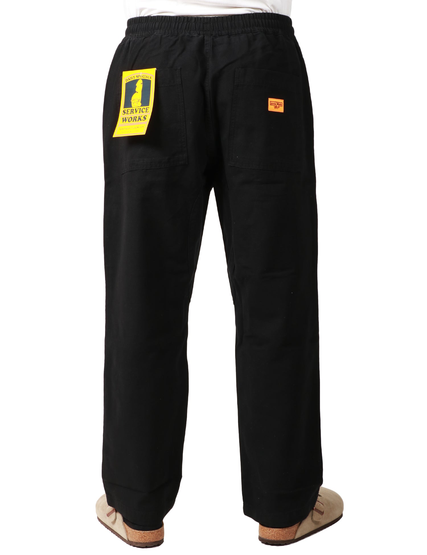 PANTALONE UOMO SERVICE WORKS NERO IN COTONE BIOLOGICO CON COULISSE E TASCHE APPLICATE DAVANTI E DIETRO