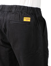 PANTALONE UOMO SERVICE WORKS NERO IN COTONE DRILL BIOLOGICO CON GAMBA A PALLONCINO E PIEGA DAVANTI