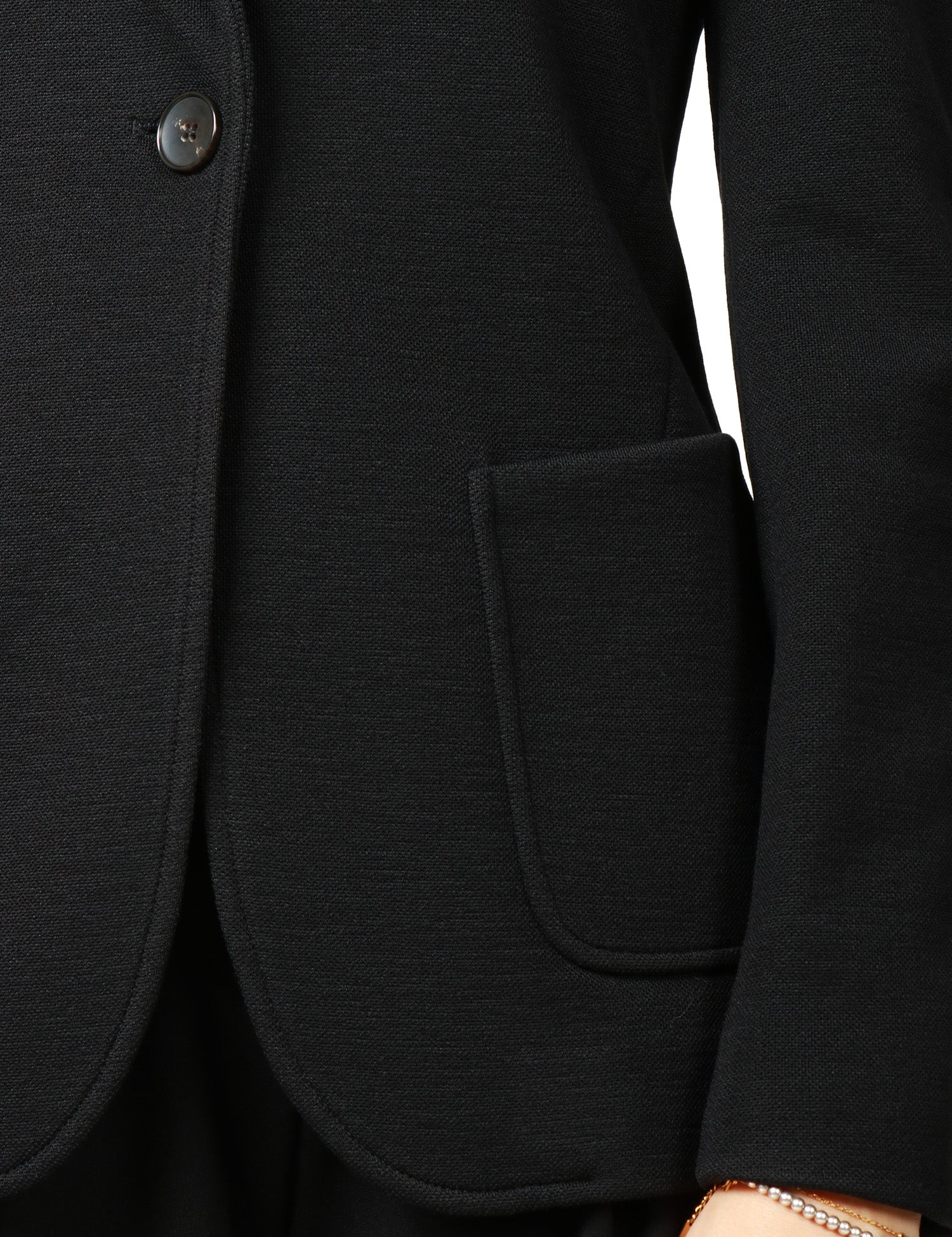 GIACCA DONNA SEVENTY NERA MONOPETTO IN MAGLIA ARMATURATA CON TASCHE APPLICATE DAVANTI