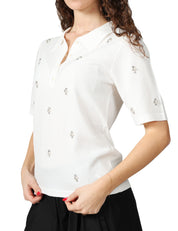 POLO DONNA SEVENTY BIANCA IN VISCOSA CON APPLICAZIONI DI PERLE E STRASS