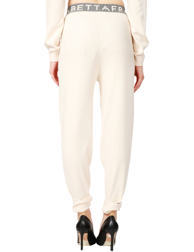 Pantalone jogger in maglia con inserti logati