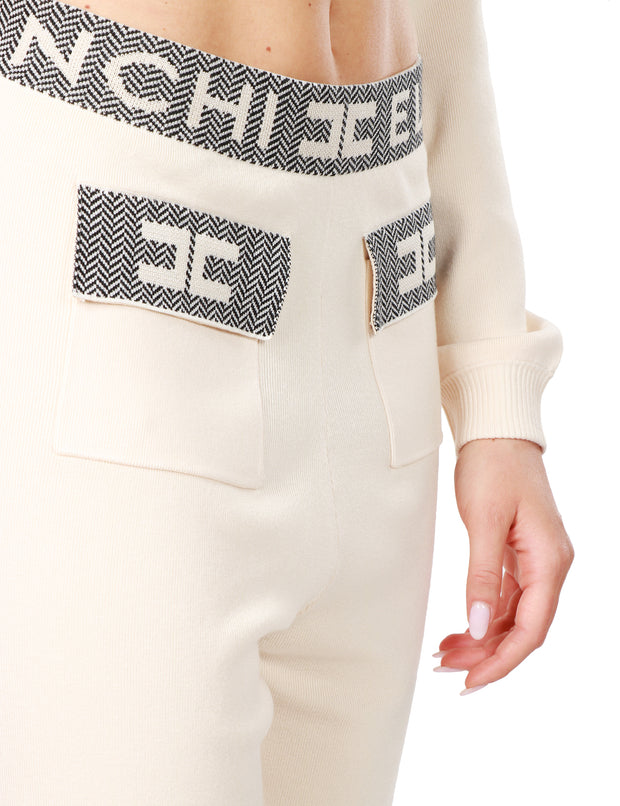 Pantalone jogger in maglia con inserti logati