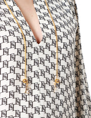 Camicia in georgette di viscosa stampa logo con accessorio sul collo